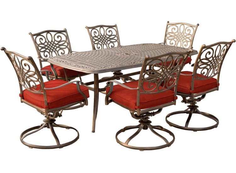 Hanover Traditions 7-Piece Outdoor Dining Set In Red/Cast With 6 Swivel Rockers, 38x72" Cast Table