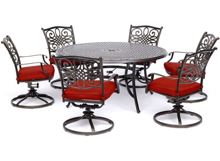 Hanover Traditions 7-Piece Outdoor Dining Set In Red/Cast With 6 Swivel Rockers, 60" Round Cast Table