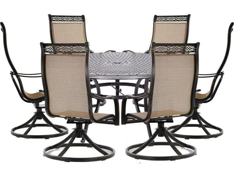 Hanover Manor 7-Piece Outdoor Dining Set In Tan Sling/Cast With 6 Sling Swivel Rockers, 60" Round Cast Table